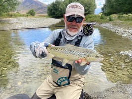 Fly fishing trout in beautiful New Zealand